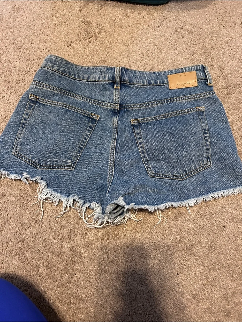 Bershka Embroidered Denim Shorts in Blue with Red & Turquoise Floral Accents